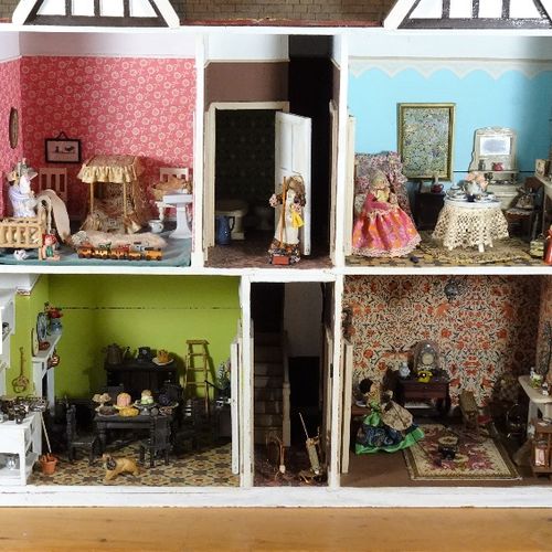 A large Tudor style painted wooden dolls house, English 20th century, A large Tu&hellip;