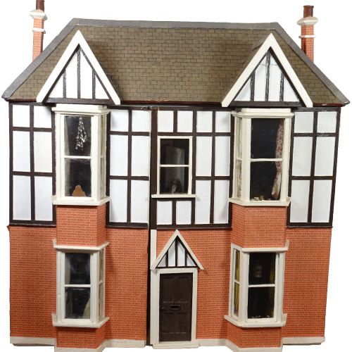 A large Tudor style painted wooden dolls house, English 20th century, A large Tu&hellip;