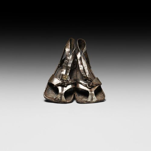 Null Hellenistic Silver Sandal Pendant. 3rd-1st century BC. A sheet-silver penda&hellip;