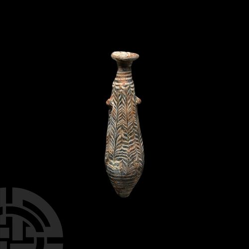 Null 希腊马赛克玻璃Alabastron，公元前3-1世纪。一个不透明的玻璃Alabastron由一个纺锤形的身体组成，有细长的颈部和宽大的凸缘，有应用的壁&hellip;