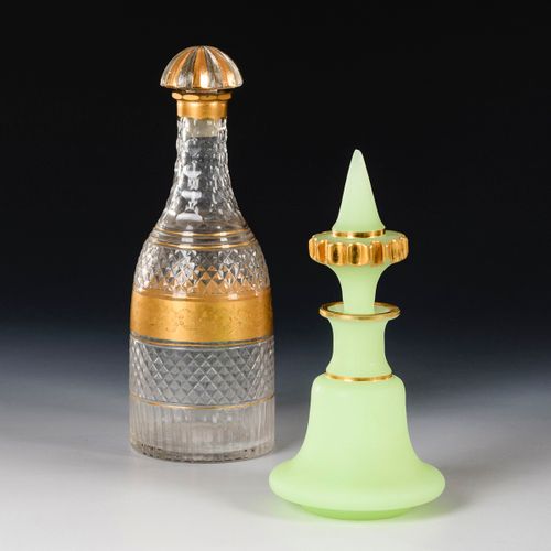Karaffe und Uranglas-Flakon 

玻璃杯和铀质玻璃瓶。 
19世纪上半叶。

1个无色玻璃杯，有石头、蜂窝和凹槽切割和金色装饰（塞子已&hellip;