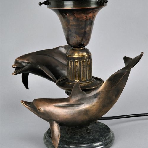 Large figure table lamp, early 20th century. 大型人物台灯，20世纪初。

以灯塔的形式。灯座由深绿色大理石制成，有&hellip;