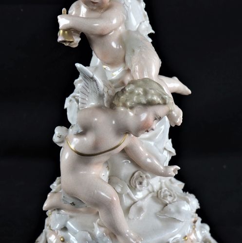 Pair of candlesticks with putti Pair of candlesticks with putti

Light porcelain&hellip;