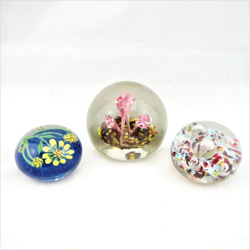Three paperweights Three paperweights

Clear glass beads, ground flat at the bot&hellip;