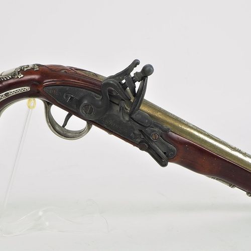 Deco muzzleloader flintlock pistol 装饰风格的枪支燧发枪

由桃花心木制成，有金属支架。侧面标有 "霍金斯"，枪管上标有 "伦&hellip;