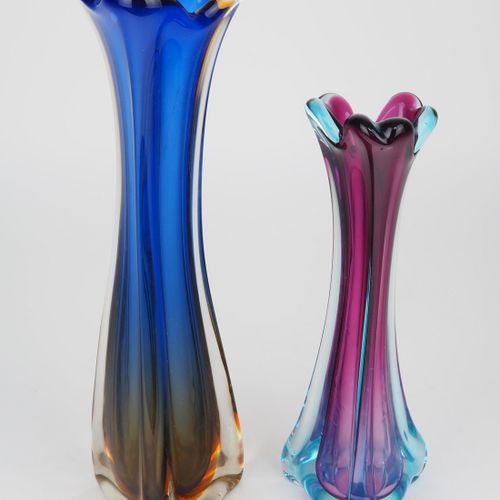Two vases, Murano Two vases, Murano

made of thick clear glass. Tripod stand, ta&hellip;