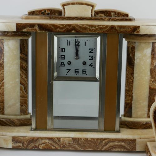 Null AN ART DECO MARBLE CLOCK GARNITURE SET

Having brown and cream marble colum&hellip;