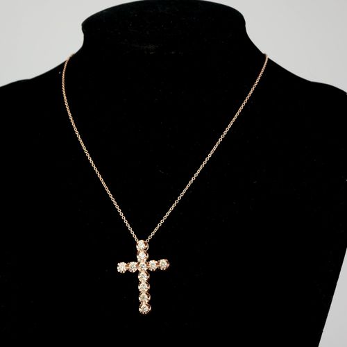 Null A 9CT ROSE GOLD & DIAMOND CROSS NECKLACE.

(approx diamond weight 2.65)