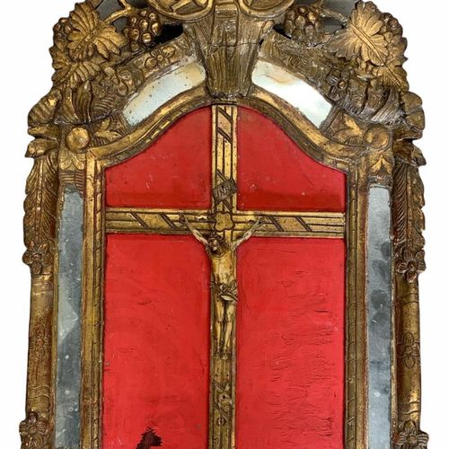 Null AN 18TH CENTURY CONTINENTAL IVORY CRUCIFIX SET IN A CARVED GILTWOOD FRAME

&hellip;