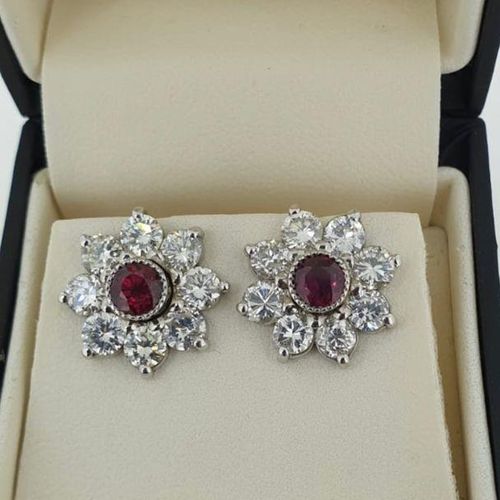 Null A PAIR OF 18CT WHITE GOLD, 1CT RUBY AND 3.41CT DIAMOND EARRINGS.

(w 14mm)