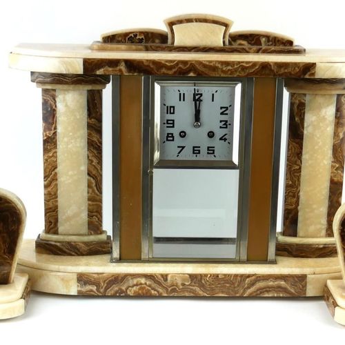 Null AN ART DECO MARBLE CLOCK GARNITURE SET

Having brown and cream marble colum&hellip;