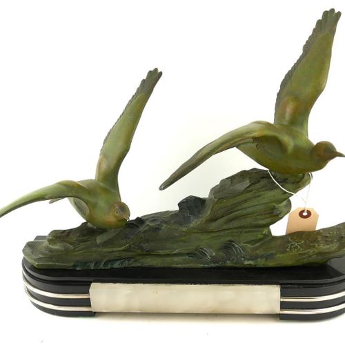 Null AN ART DECO SPELTER AND MARBLE BIRD SCULPTURE

Two spelter coastal birds in&hellip;