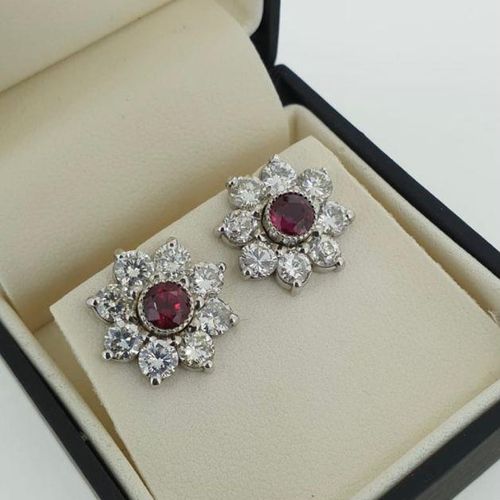 Null A PAIR OF 18CT WHITE GOLD, 1CT RUBY AND 3.41CT DIAMOND EARRINGS.

(w 14mm)