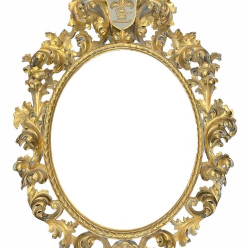 Null 19世纪意大利雕花鎏金木佛罗伦萨大型椭圆镜

有滚动的叶子装饰，中央有盾牌形式的纹章，有一条蛇缠绕在芙蓉花上。

(高122厘米 x 长23厘米 x &hellip;