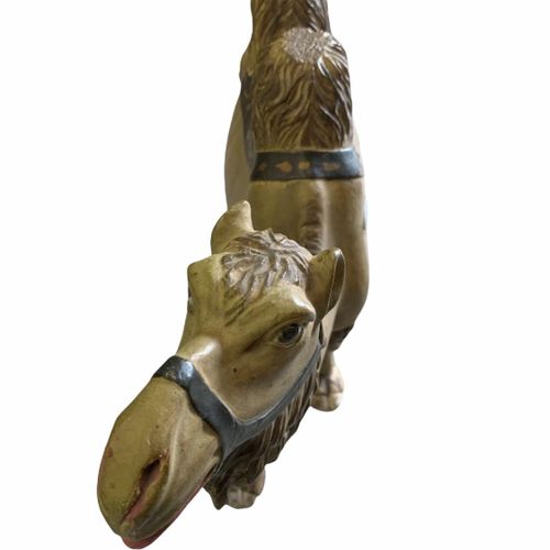 Null AN EARLY 20TH CENTURY CARVED WOOD AND PAINTED HUMPBACK CAMEL. 

(h 41cm x w&hellip;