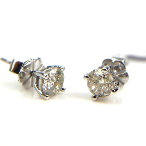 Null A PAIR OF 18CT WHITE GOLD DIAMOND STUDS.

(approx. 1ct total)