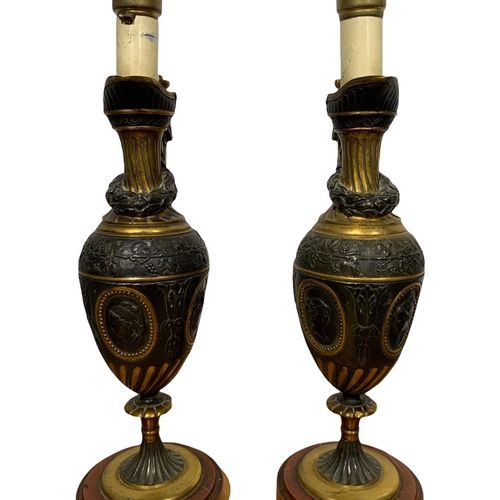 Null 
A PAIR OF 19TH CENTURY GRAND TOUR BRONZE AND GILT BRONZE EWERS

decorated &hellip;