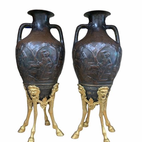 Null A PAIR OF 19TH CENTURY BRONZE AND PARCEL GILT URNS 

Cast with Neoclassical&hellip;