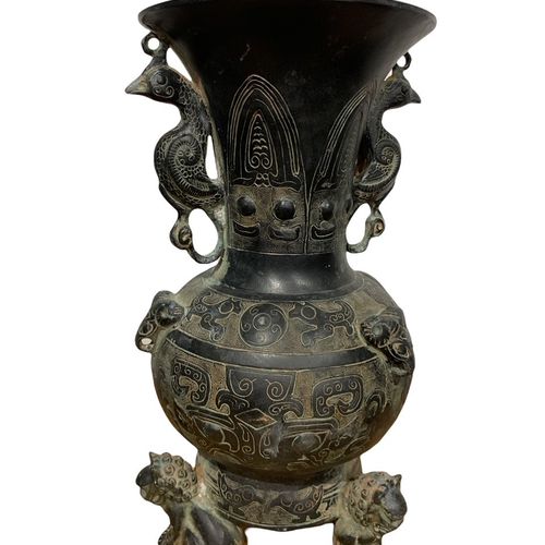 Null 
A CHINESE BRONZE VASE OF ARCHAISTIC DESIGN 

with double handles in the fo&hellip;