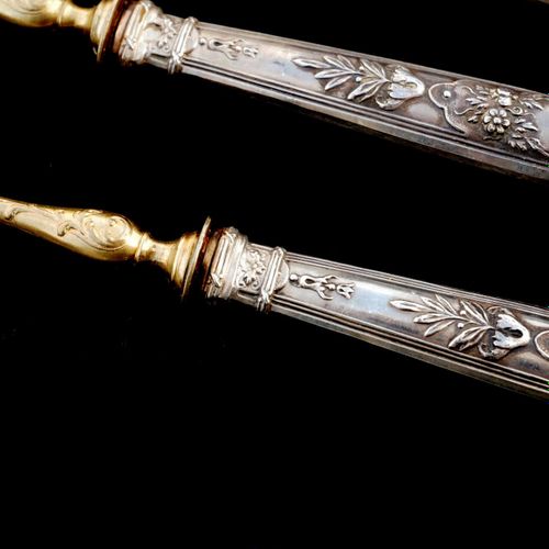 Null 19世纪法国四件套镀金银鱼餐具

印有 "Minerva Fineness"，每件都有标记。

(126.5g)