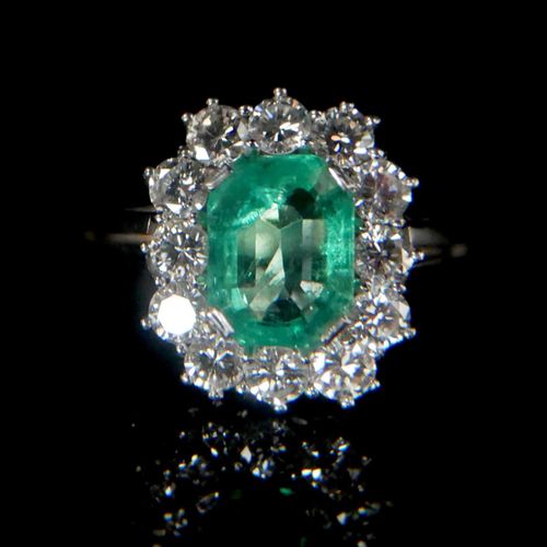 Null 
AN 18CT WHITE GOLD, NATURAL EMERALD AND DIAMOND CLUSTER RING. 




(emeral&hellip;