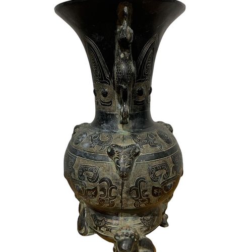 Null 
A CHINESE BRONZE VASE OF ARCHAISTIC DESIGN 

with double handles in the fo&hellip;