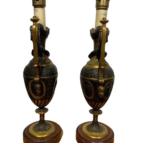 Null 
A PAIR OF 19TH CENTURY GRAND TOUR BRONZE AND GILT BRONZE EWERS

decorated &hellip;