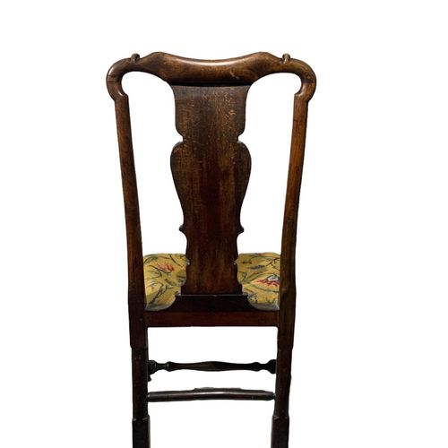 AN 18TH CENTURY GEORGIAN WALNUT SIDE CHAIR 
With scrolling carved back above a n&hellip;