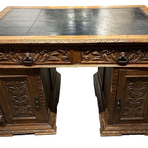Null A 19TH CENTURY CARVED OAK PEDESTAL DESK

The tooled leather top above two d&hellip;
