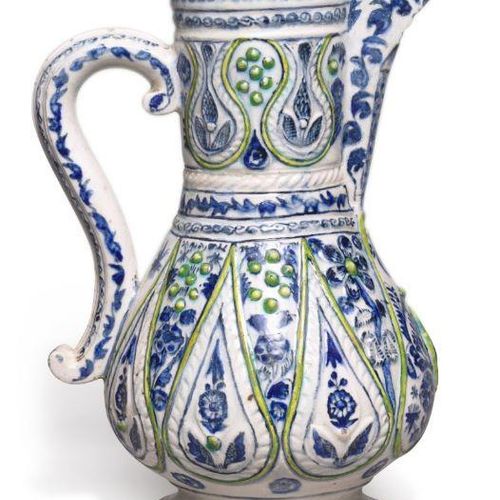 A large Kütahya moulded pottery ewer, Turkey, 18th century of baluster form rest&hellip;