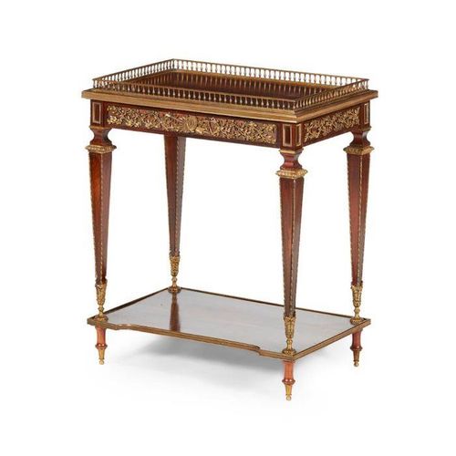 A 19TH CENTURY FRENCH MAHOGANY AND GILT BRONZE MOUNTED TABLE IN THE STYLE OF LIN&hellip;