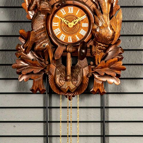 Null 
Imponente orologio a "cucù", seconda metà del XX secolo, cassa in legno co&hellip;
