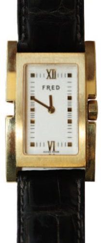 FRED Montre de dame en or jaune à cadran rectangulaire sur bracelet cuir. Mouvem&hellip;