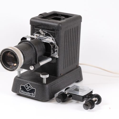 Null Agfa projector. Karator U. Narrow film camera in case.