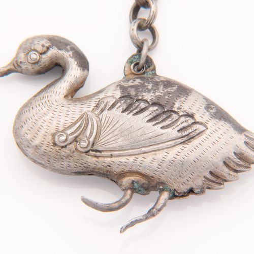 Amulett Chaînette, métal argenté, avec 3 pendentifs, canard et clochette, 1 corn&hellip;