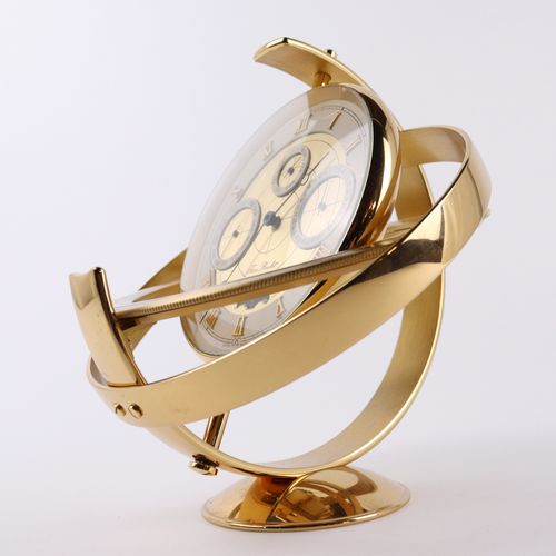 Jean Roulet - Tischuhr 1988年，Jean Roulet，瑞士，黄铜，镀金，世界时钟形状的台钟，白色表盘上有罗马数字和月相指示，日、周、&hellip;
