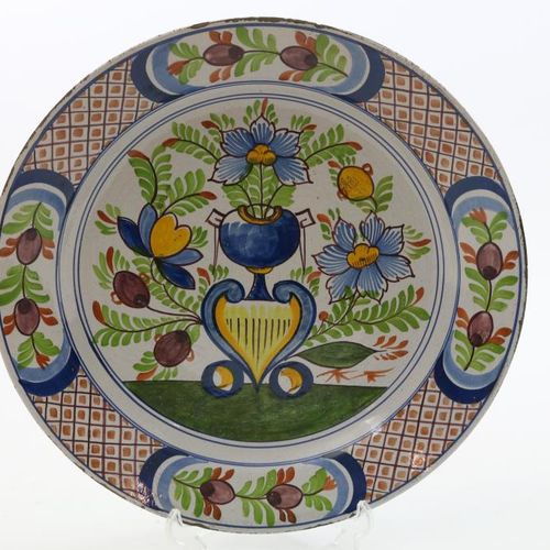 Aardewerk polychroom sierbord Plat en poterie polychrome, décoré de fleurs, Fran&hellip;