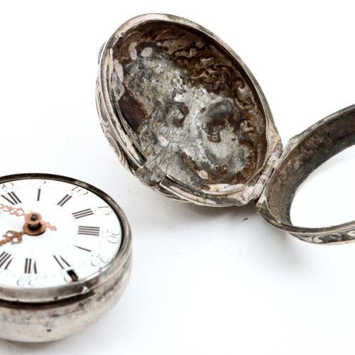 Null Antique richly decorated vest pocket watch in double silver case