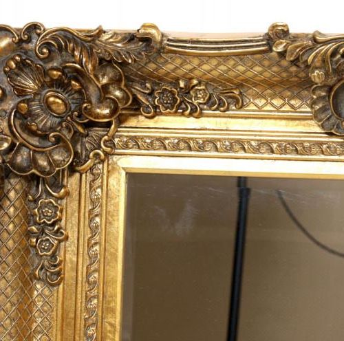 Null Espejo pulido en marco dorado, h.122 x w.90 cm.