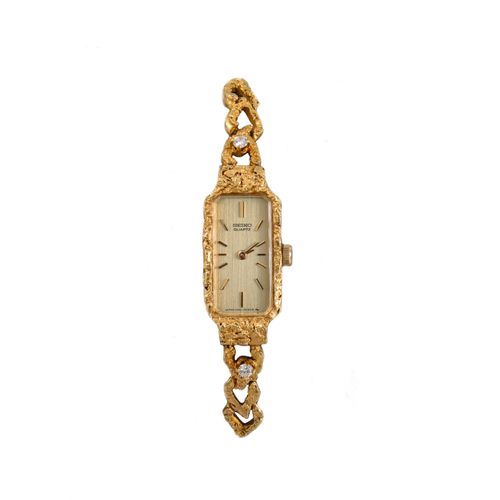 Null A 1980'S GOLD AND DIAMOND SET LADY'S SEIKO QUARTZ WRISTWATCH, in 18ct gold,&hellip;