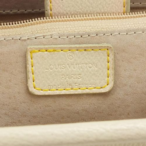 Null 20世纪初的路易威登皮革手袋，带猪皮衬里和零钱包，宽34.5厘米 - 实时竞拍请访问www.Eastbourneauction.Com