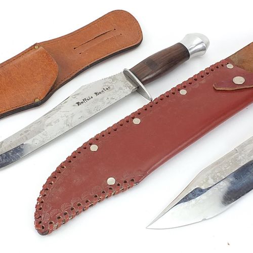 Null Two Bowie knives with leather sheaths including one with horn handle, impre&hellip;