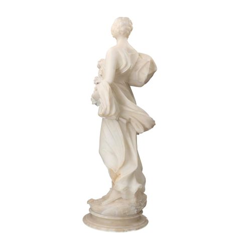 Null 石膏雕像，描绘了一个带花的女人，19世纪。

高：70厘米。