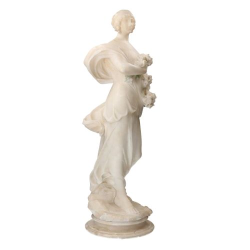 Null Alabaster statue depicting a woman with flowers, 19th century.

H: 70 cm.