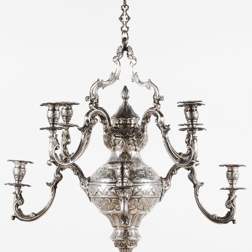 Null An important eight branch chandelier
Brazilian silver

Profuse reliefs deco&hellip;