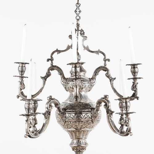 Null An important eight branch chandelier
Brazilian silver

Profuse reliefs deco&hellip;