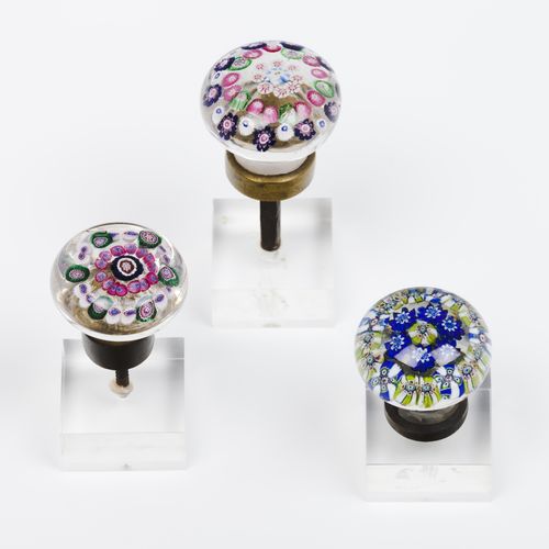 Null A group of three door knobs
Glass paste

Inner "millefiori" decoration

Fra&hellip;