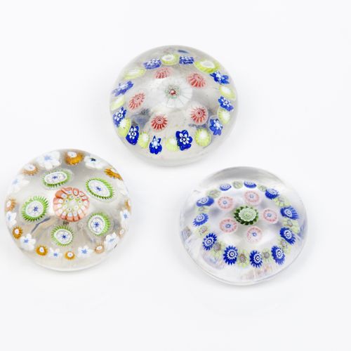 Null A group of three paperweights
Glass paste

Inner "millefiori" decoration

F&hellip;