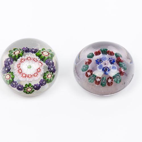 Null A group of two paperweights
Glass paste

Inner "millefiori" decoration

Fra&hellip;