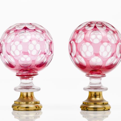 Null A pair of staircase finials
Mirrored red glass

Yellow metal fittings

Poss&hellip;